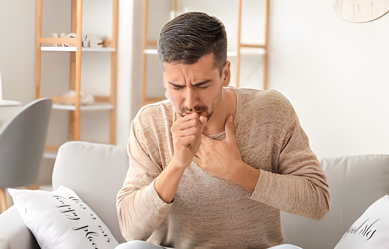 Man coughing after being exposed to mold